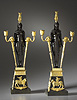 A magnificent pair of Empire gilt and patinated bronze two-light candelabra retour dâ€™Egypte attributed to Pierre-Philippe Thomire after a design by Charles Percier